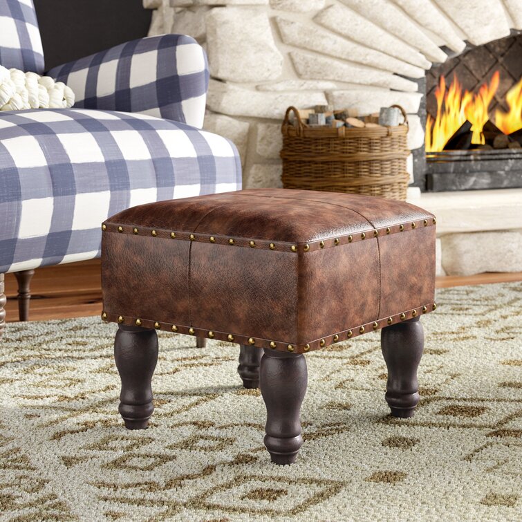 Cognac faux store leather ottoman